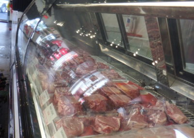 beef, pork and chicken in refrigerator at Destin Ice