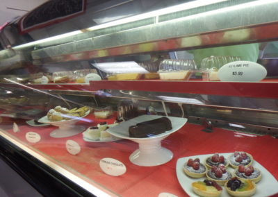 pastries, keylime pie and fruit tarts in refrigerator case at Destin Ice Seafood