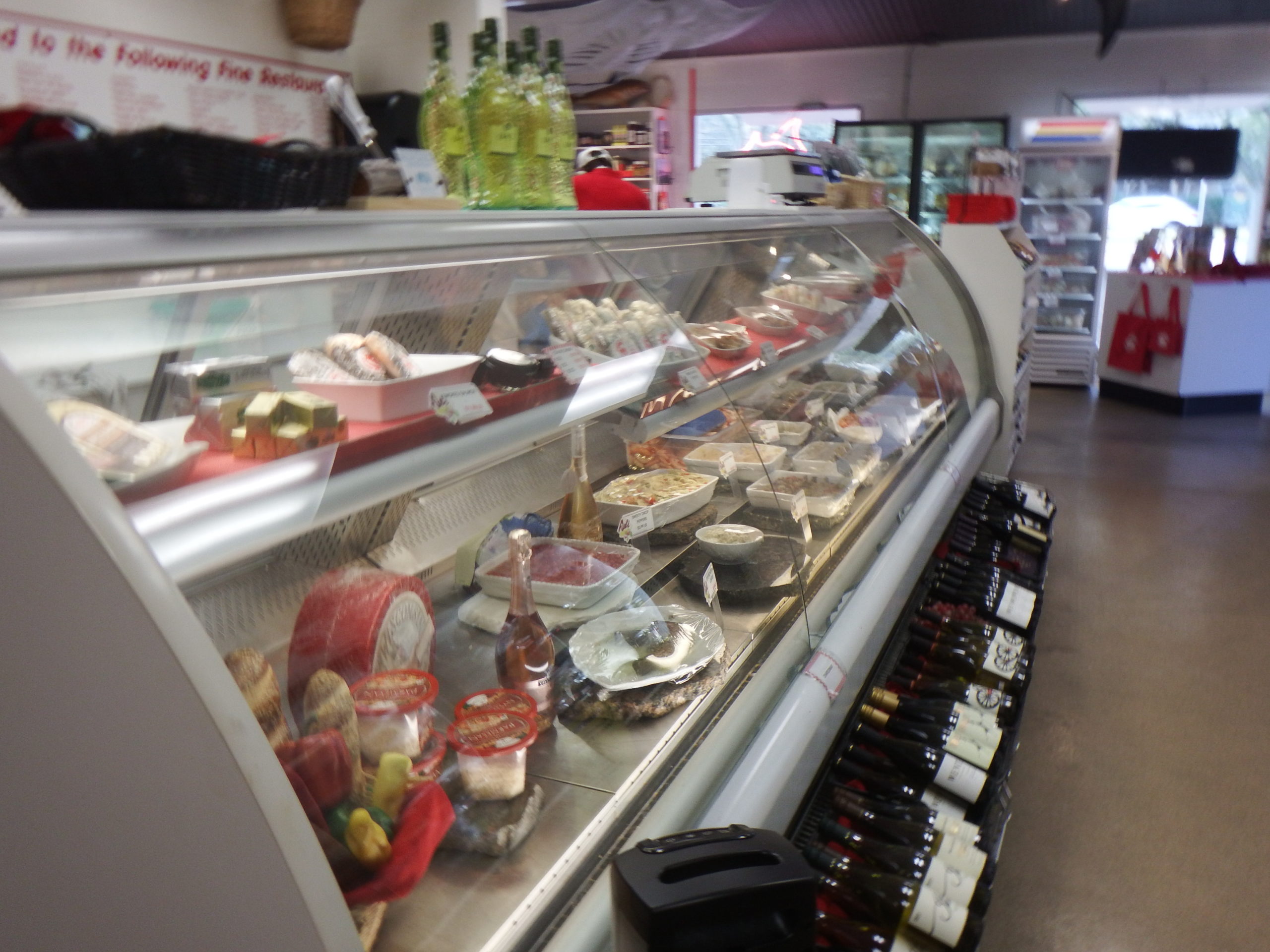deli case with prepared foods at Destin Ice