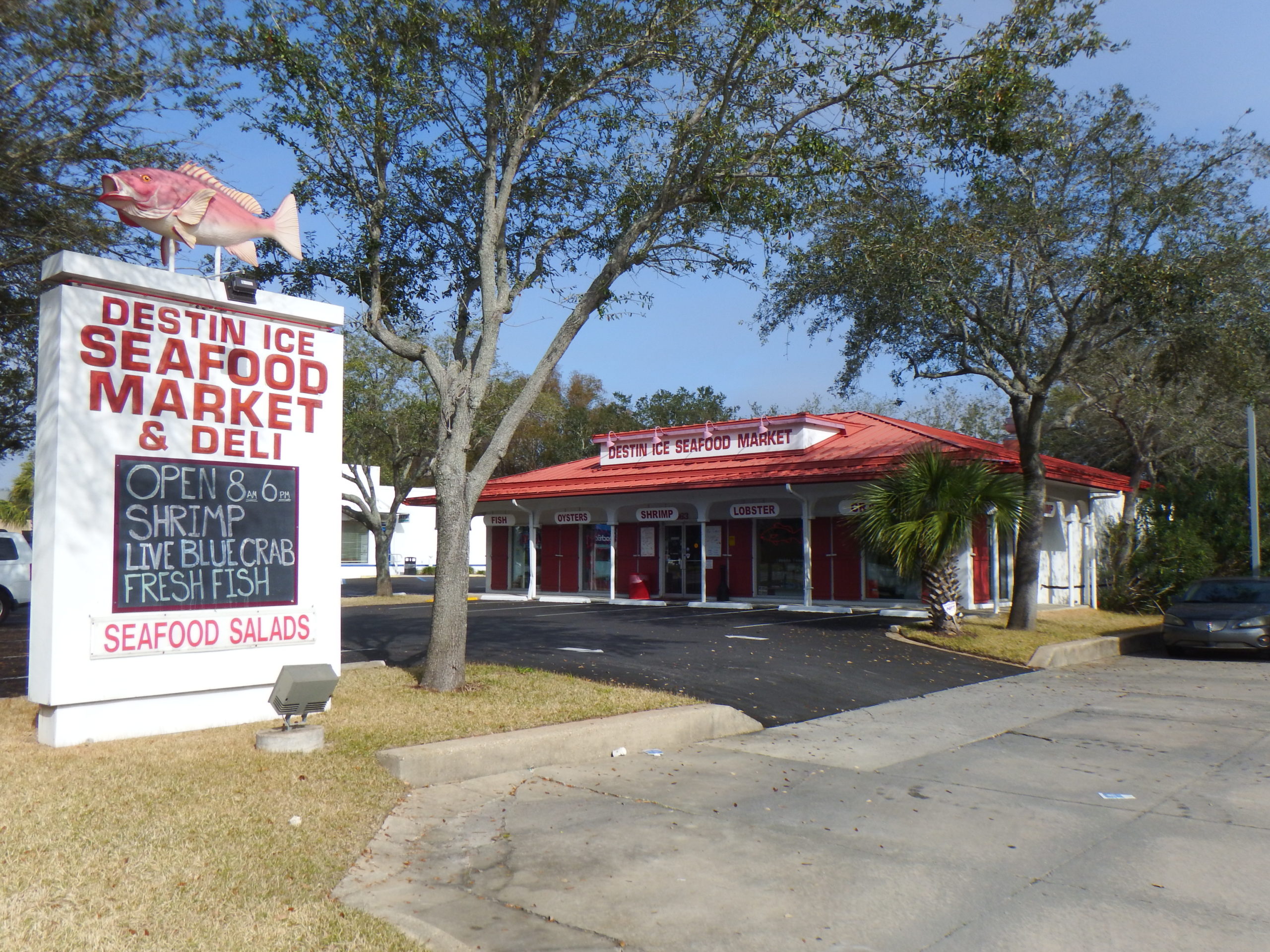 sign and front of building for Destin Ice Seafood Market and Deli